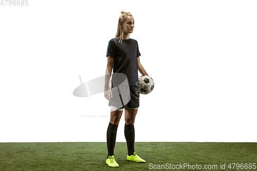 Image of Female soccer player practicing and training at the stadium