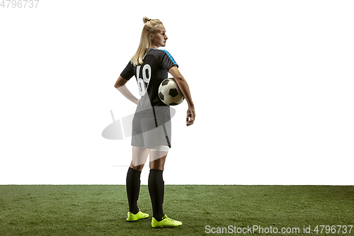 Image of Female soccer player practicing and training at the stadium