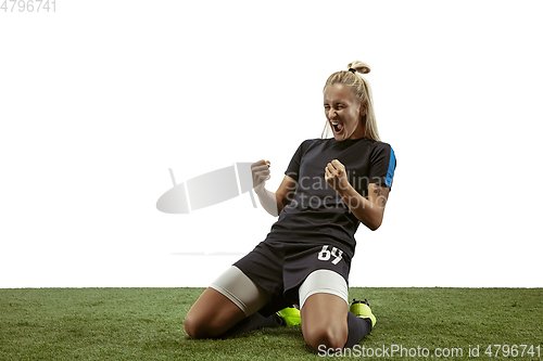 Image of Female soccer player practicing and training at the stadium