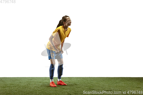 Image of Female soccer player practicing and training at the stadium