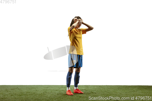 Image of Female soccer player practicing and training at the stadium