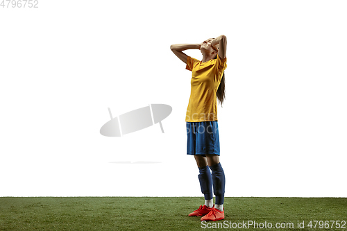 Image of Female soccer player practicing and training at the stadium