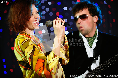 Image of Female singer and male guitar player