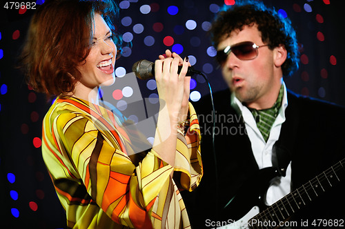 Image of Female singer and male guitar player