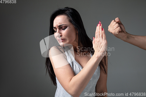 Image of Woman being under domestic abuse and violence, concept of female rights