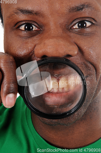 Image of Close up of face and teeth's of African man