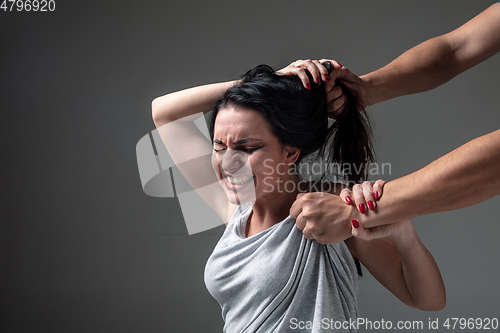 Image of Woman being under domestic abuse and violence, concept of female rights