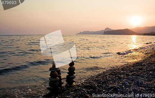 Image of Sunset over the sea and mountains. Ukraine. Crimea.