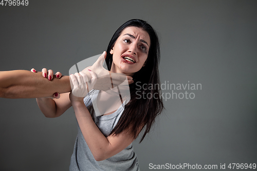 Image of Woman being under domestic abuse and violence, concept of female rights