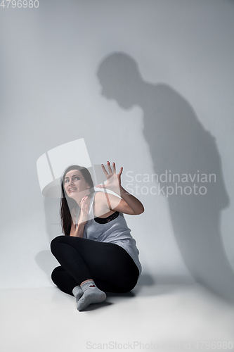 Image of Woman being under domestic abuse and violence, concept of female rights