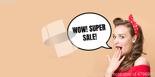 Image of Sales concept, portrait of woman with speech bubble on studio background, copyspace