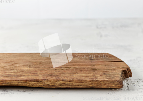 Image of old empty wooden cutting board