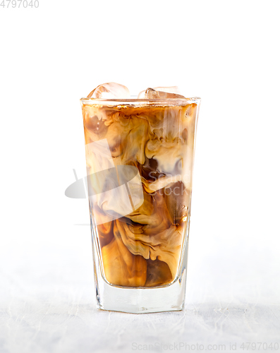 Image of glass of iced coffee with milk