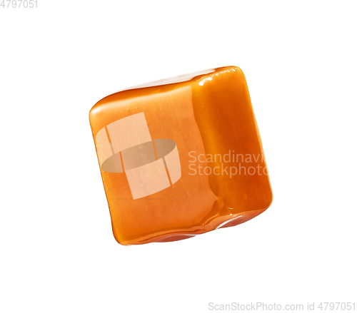 Image of caramel candy on white background