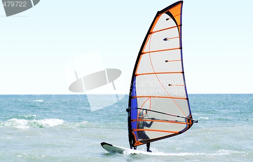 Image of Windsurfer on the sea in the afternoon