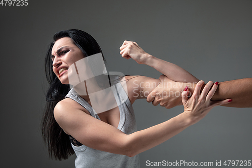 Image of Woman being under domestic abuse and violence, concept of female rights