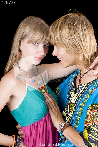 Image of Young beauty couple. Isolated on black background
