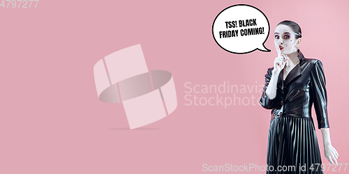 Image of Woman as a vampire in black dress on purple background, black friday