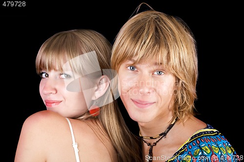 Image of Portrait of the young beauty couple. Isolated on black