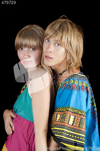 Image of Portrait of the young beauty couple. Isolated on black backgroun