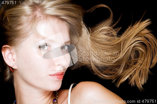 Image of Portrait of the beauty blonde. Isolated on black background