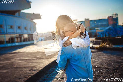 Image of Tanned young caucasian couple, modern lovestory in film grain effect