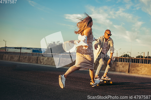 Image of Tanned young caucasian couple, modern lovestory in film grain effect