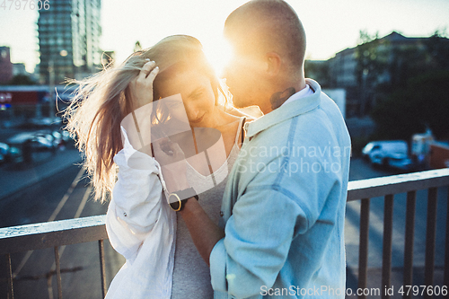 Image of Tanned young caucasian couple, modern lovestory in film grain effect