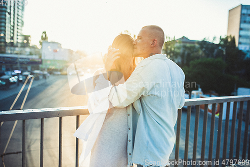 Image of Tanned young caucasian couple, modern lovestory in film grain effect