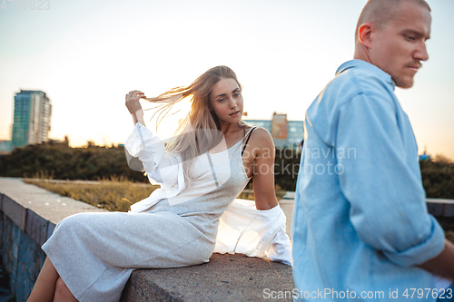 Image of Tanned young caucasian couple, modern lovestory in film grain effect