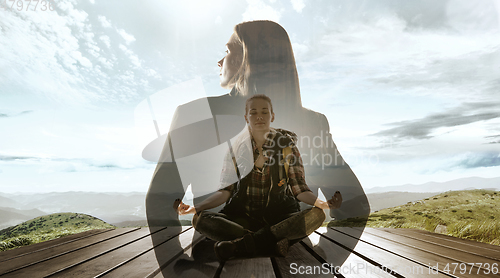 Image of Silhouette of businesswoman with landscapes on background, double exposure.