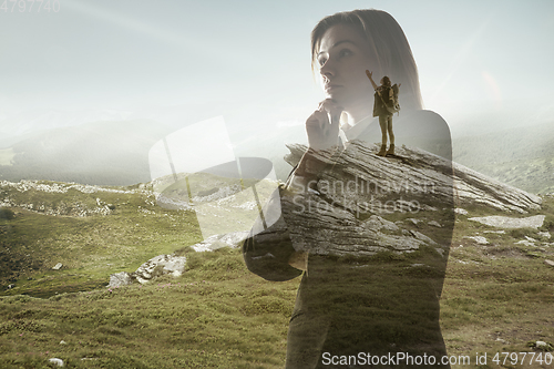 Image of Silhouette of businesswoman with landscapes on background, double exposure.