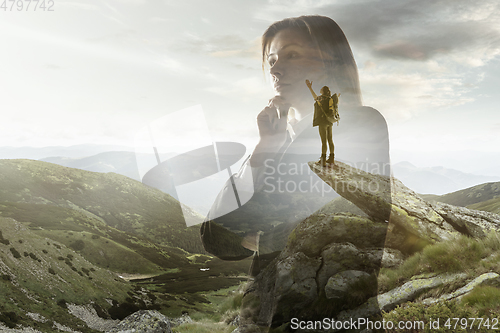 Image of Silhouette of businesswoman with landscapes on background, double exposure.