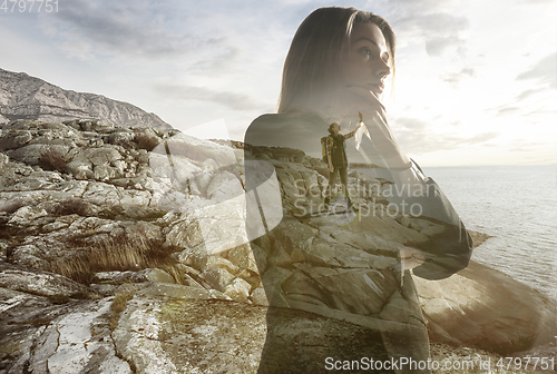 Image of Silhouette of businesswoman with landscapes on background, double exposure.