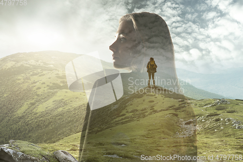 Image of Silhouette of businesswoman with landscapes on background, double exposure.