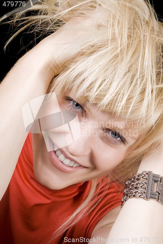 Image of Portrait of the smiling young beauty blonde. Isolated 