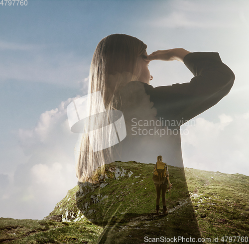 Image of Silhouette of businesswoman with landscapes on background, double exposure.