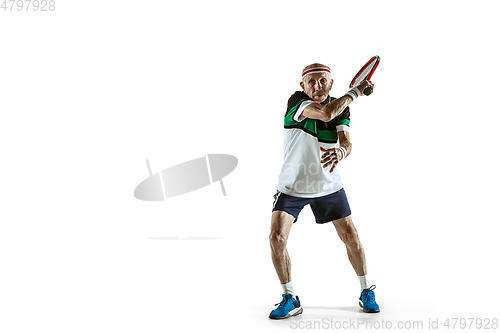 Image of Senior man playing tennis in sportwear isolated on white background