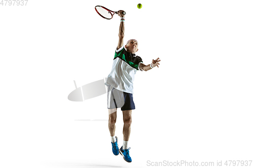 Image of Senior man playing tennis in sportwear isolated on white background