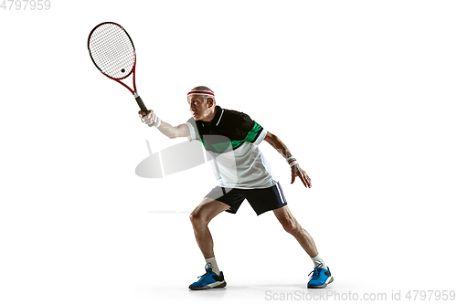 Image of Senior man playing tennis in sportwear isolated on white background