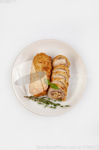Image of Sliced Roll With Greenery