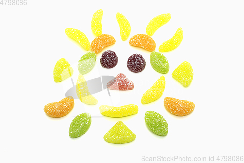 Image of Abstract muzzle from multicolored marmalade of different shapes 