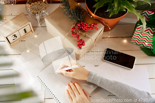 Image of Writes wishes, dreams and goals, making plan for New Year and Christmas