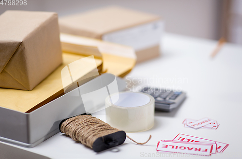 Image of parcel boxes and packing stuff at post office