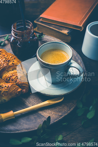 Image of Breakfast - Croissants with nuts and cup of coffee