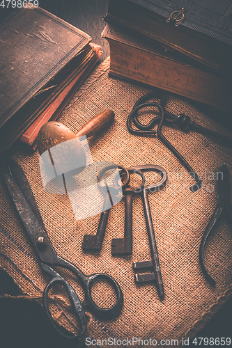 Image of Old tools, books, keys and supplies in vintage style