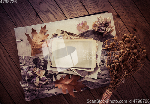 Image of Memories - stock of old and vintage photos on wooden background