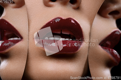 Image of beautiful woman lips closeup with mirror reflections