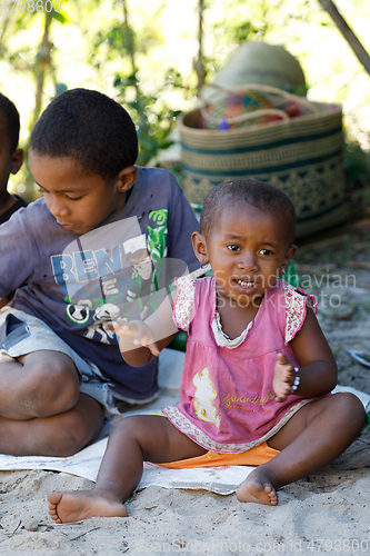 Image of Countryside malagasy children from village sitting and resting i