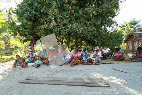 Image of Malagasy woman from village traditional singing and dancing